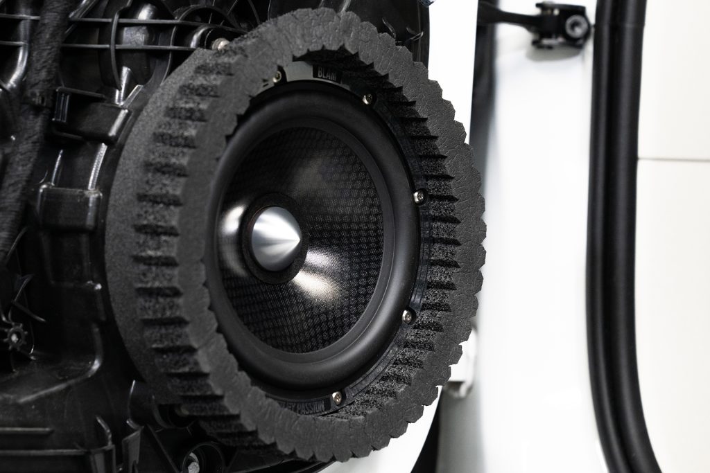 ResoNix Sound Solutions CCF Strips Foam Rings Installed around midbass speaker in a car door