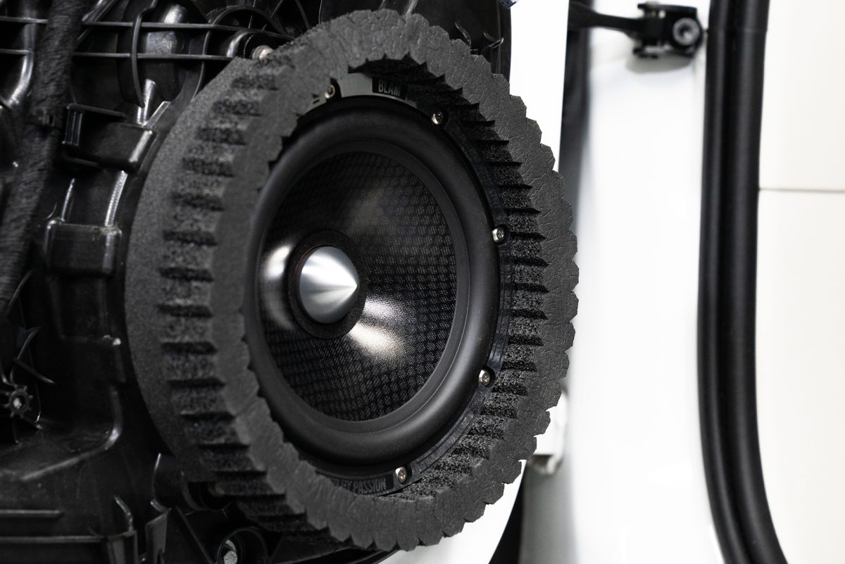 ResoNix Sound Solutions CCF Strips Foam Rings Installed around midbass speaker in a car door